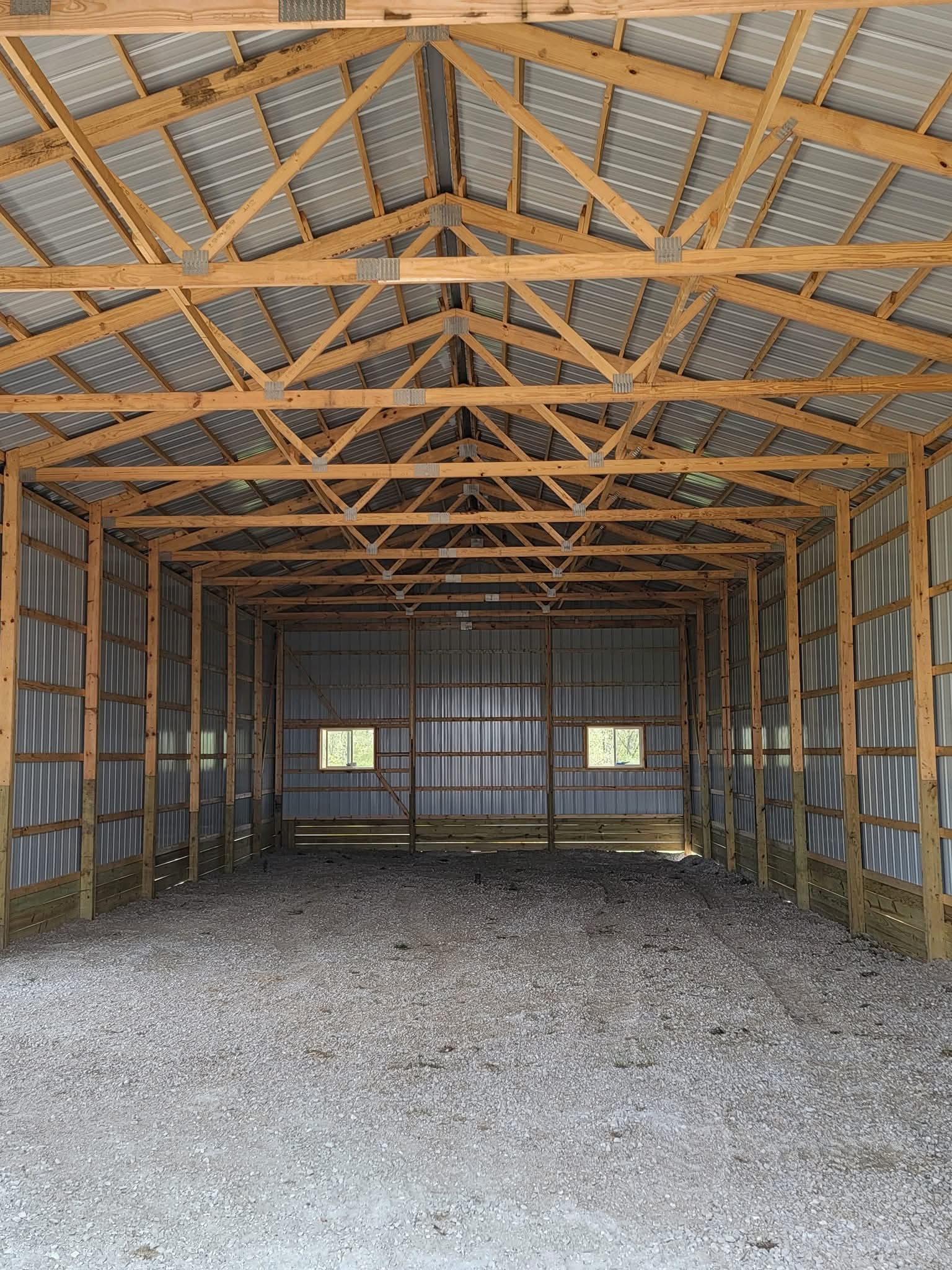 Interior framing view of the 30x80x14 post frame shell in Marseilles, IL