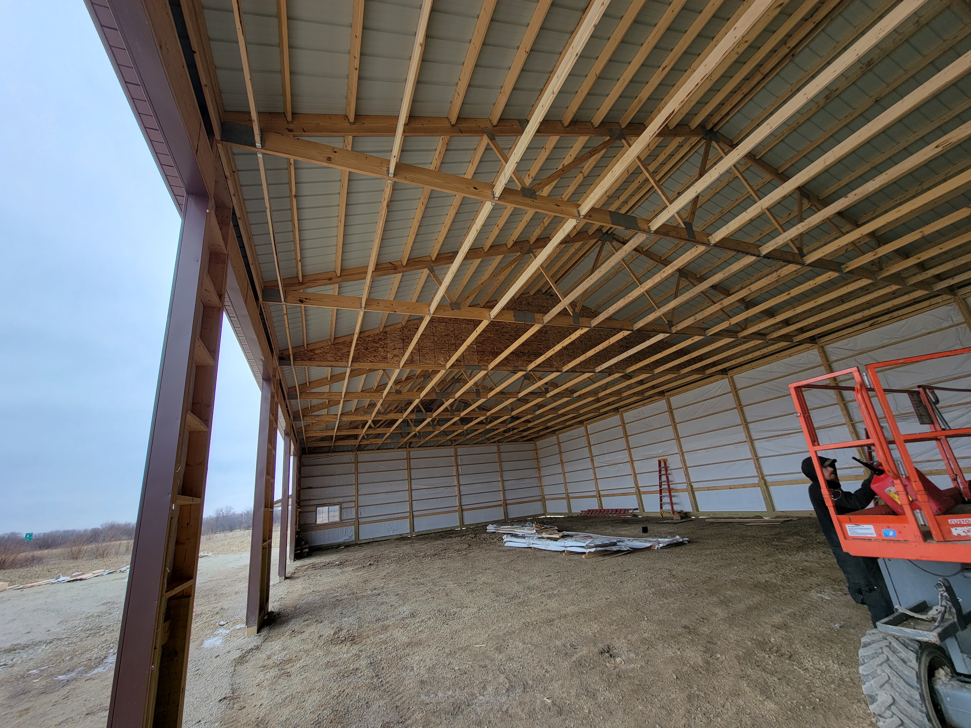 Framing and insulation work on 50x100 shop in Braidwood Illinois