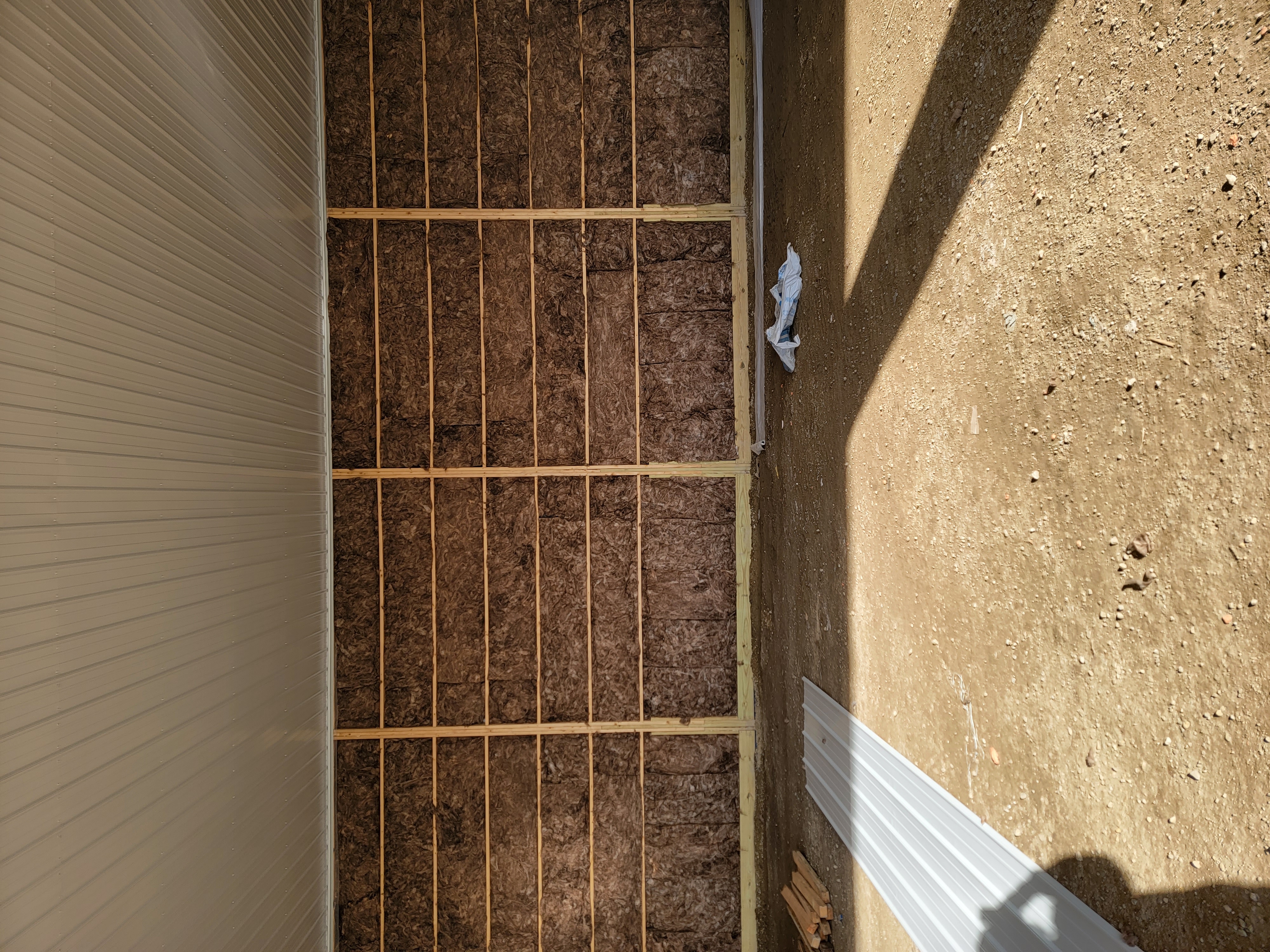 Metal liner panels inside 50x100 insulated shop in Braidwood Illinois