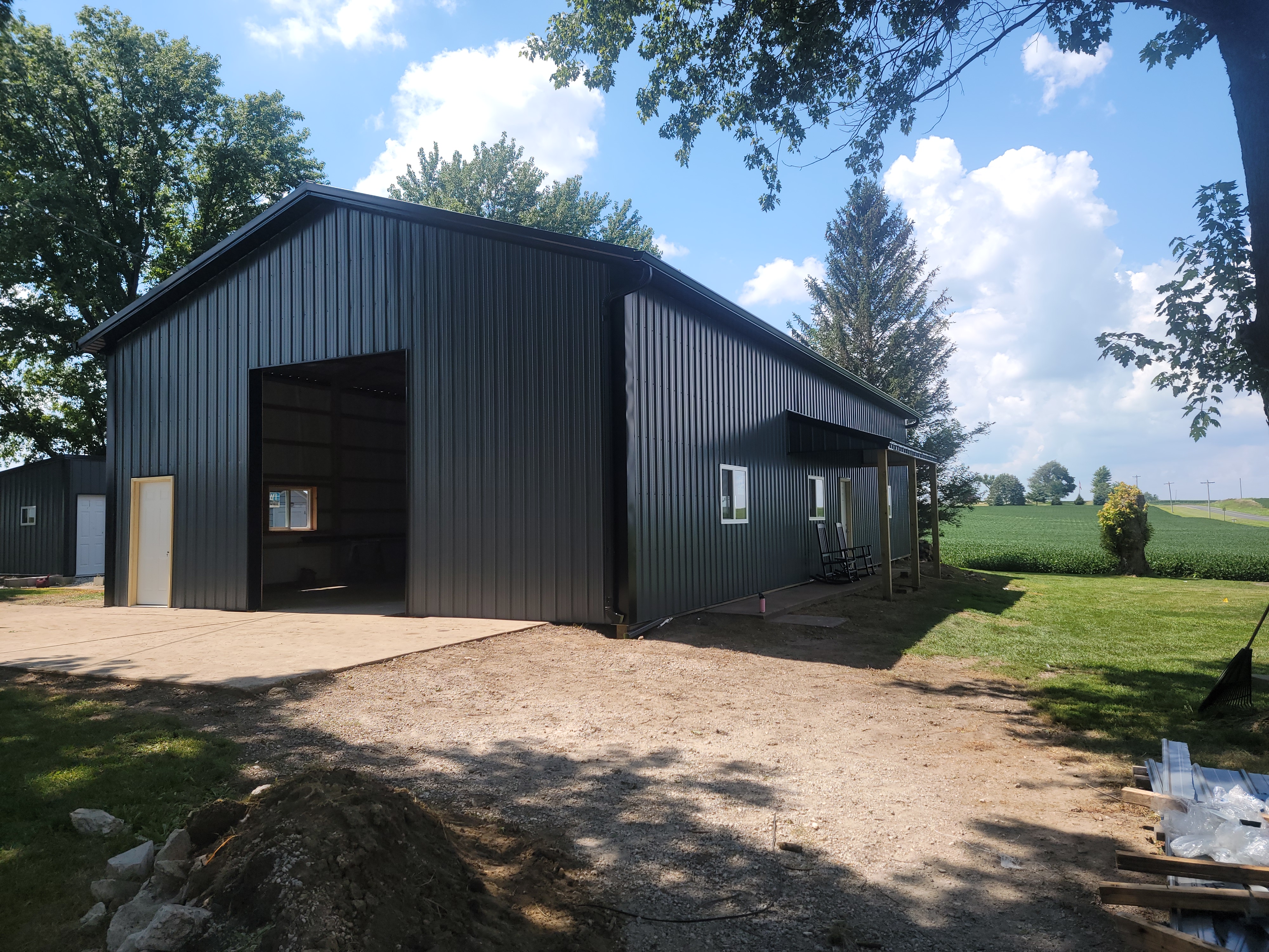 Side and front angle of 36x64 garage with overhead door in Ottawa Illinois