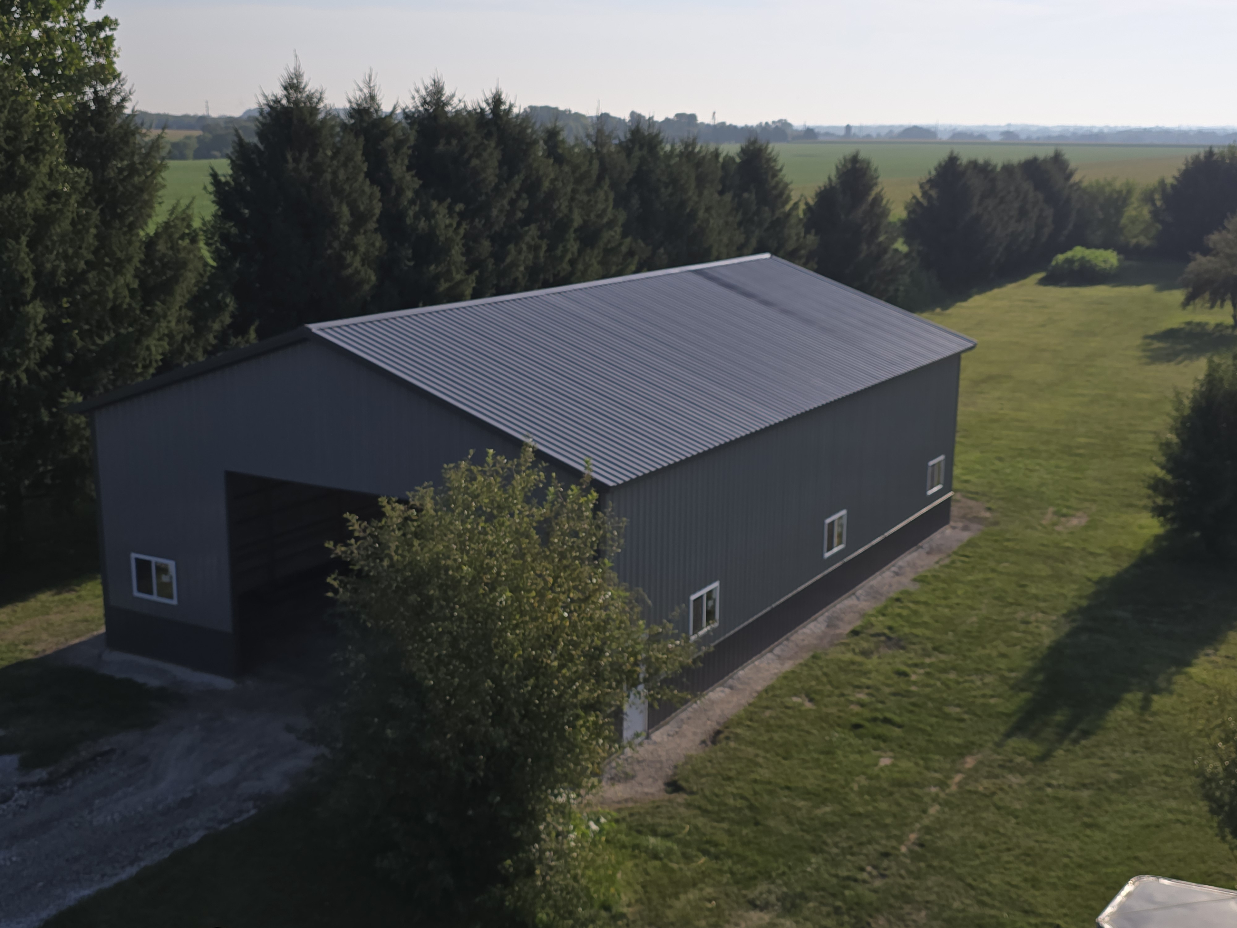Exterior angle of 40x64 rural shop with overhead door in Ottawa Illinois
