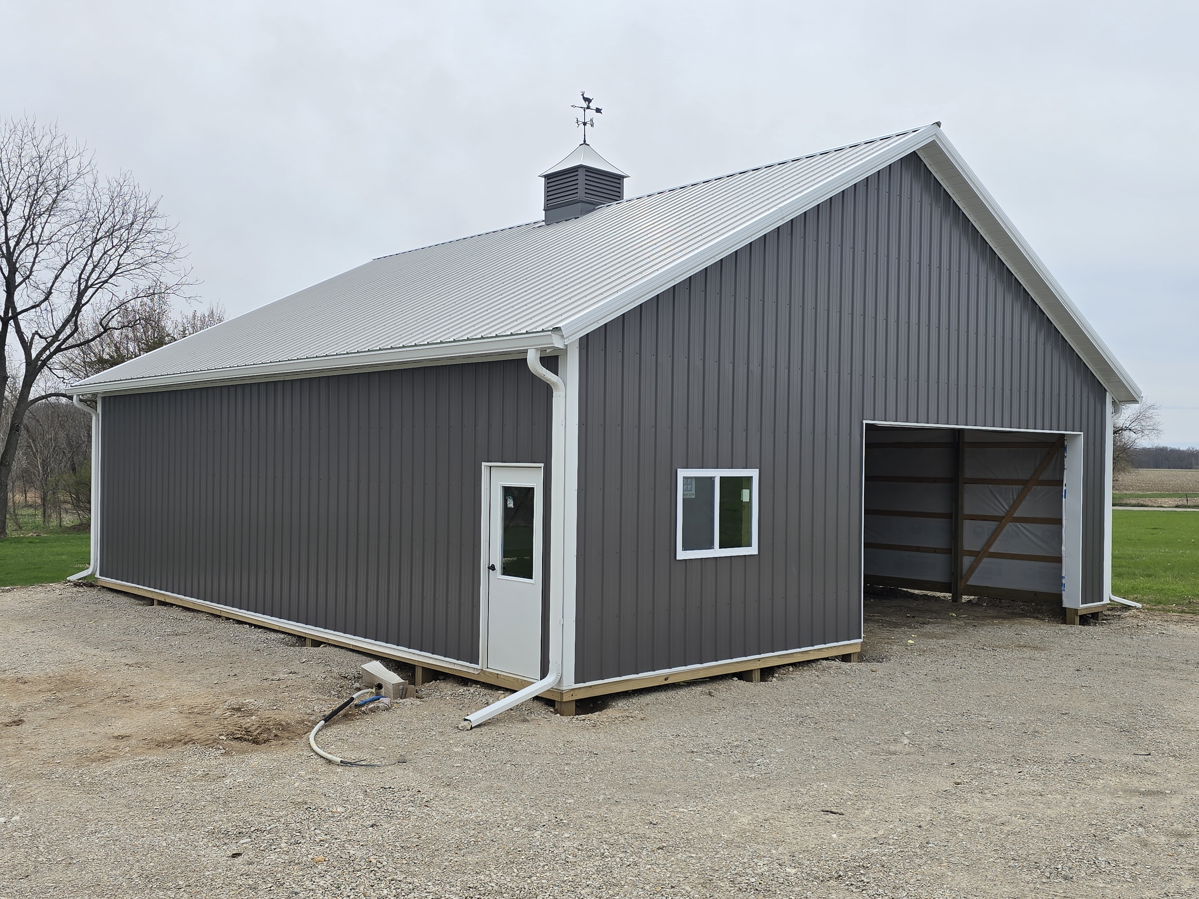 36x40x10 post frame building with cupola in Sheridan Illinois by A15 Carpentry